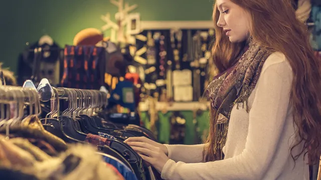 Woman browsing clothes in a shop